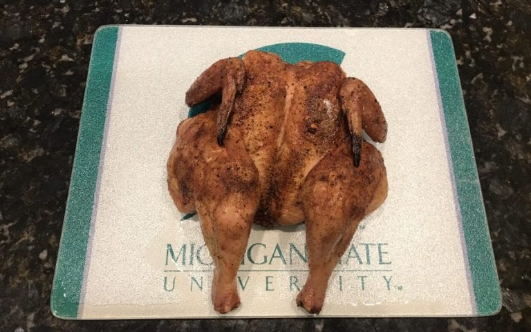 Big Green Egg Cooked Spatchcock Chicken with Raging River Rub by Dizzy Pig