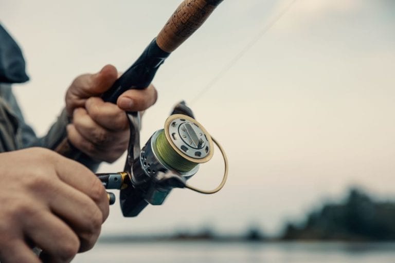 Fisherman with Fishing Rod