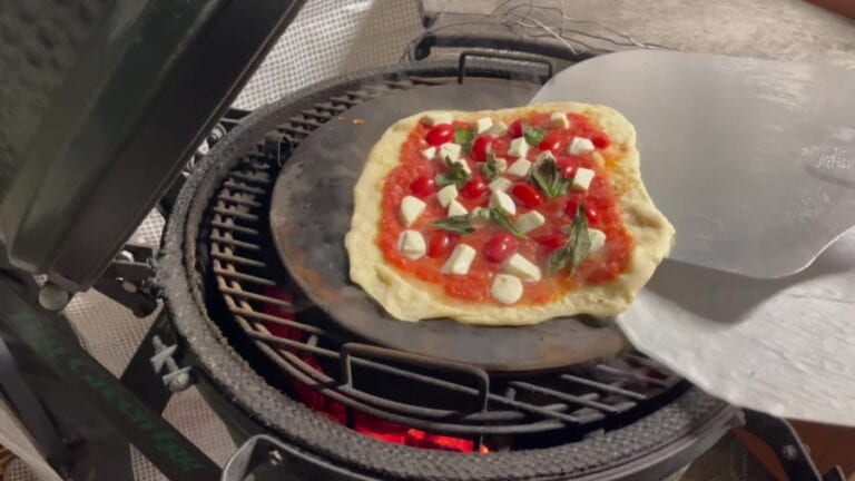 Own - Margherita Pizza on the Big Green Egg - Turn and Remove Parchment Paper