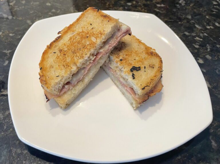 Own - Dijon Ham & Swiss w Parmesan Sauce Panini on the Blackstone - Plated