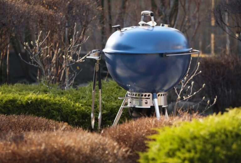 Blue Charcoal Kettle Grill in Garden