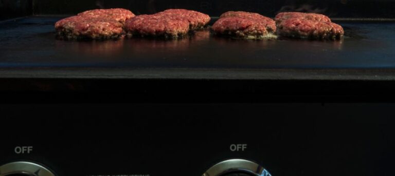 Side View of Cooking Hamburgers on a Blackstone Griddle