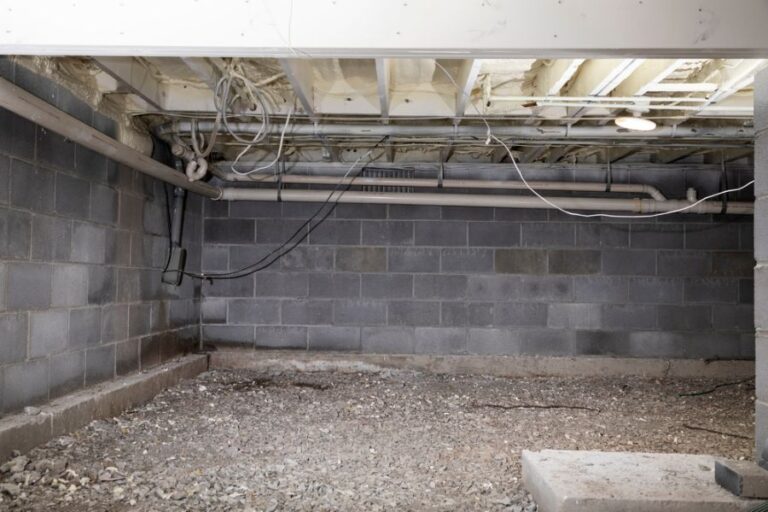 Cinder Block Wall in a Crawl Space With Spray Foam Insulation