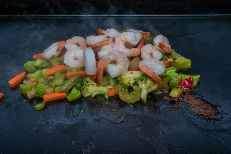 Stir Fry With Veggies and Shrimp Being Cooked on a Blackstone Griddle