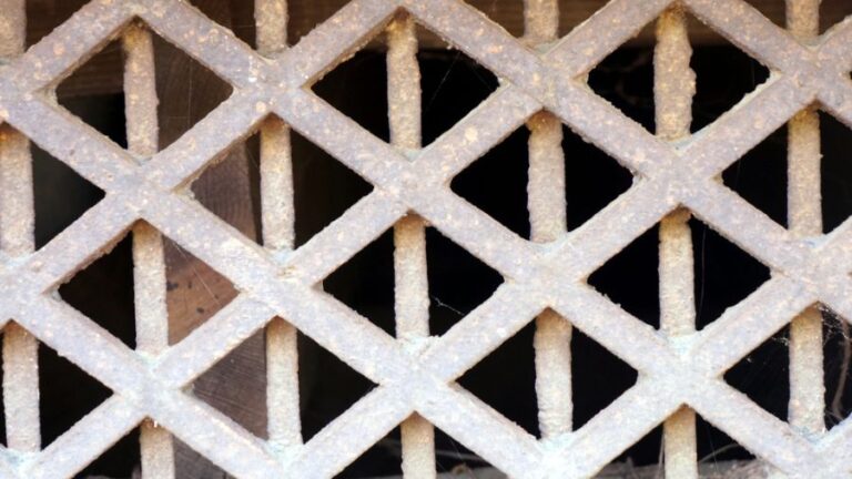 Closeup of a Crawl Space Vent Grate