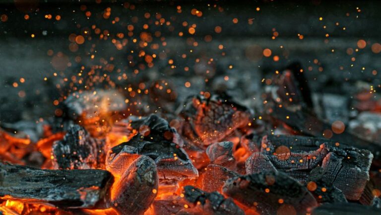 Glowing Hot Charcoal Briquettes in a Barbecue Grill
