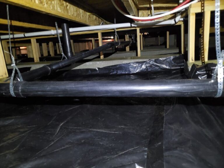 Crawl Space Under a Residence With a New Vapor Barrier