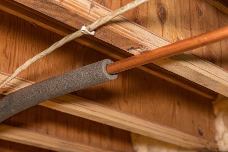 Water Pipe With Insulation in the Crawlspace of a House