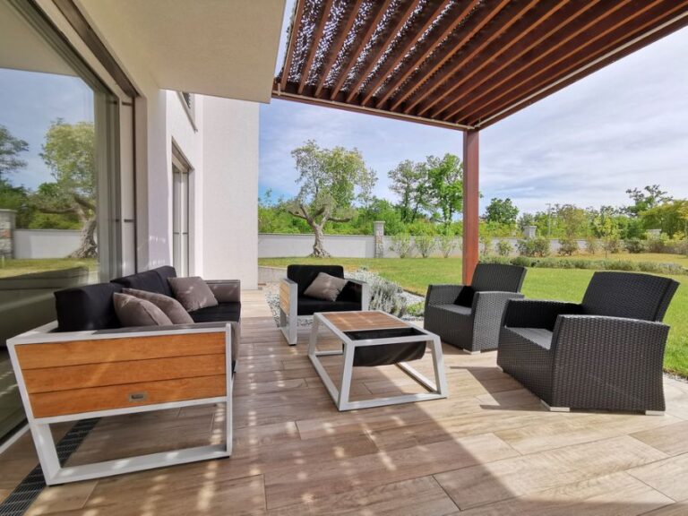 Pergola Attached to a House Covering a Terrace