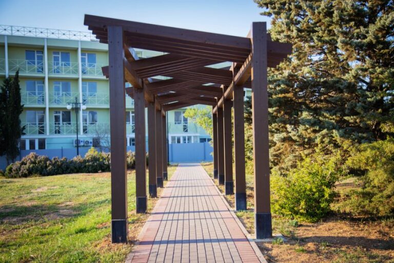 Pergola Over a Long Path in a Park