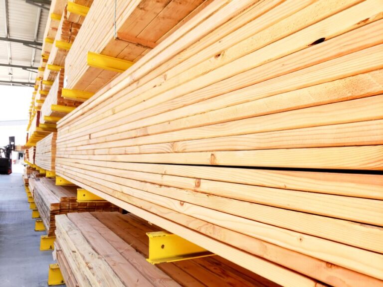 View of Pressure Treated Wood Down the Aisle of a Lumber Yard