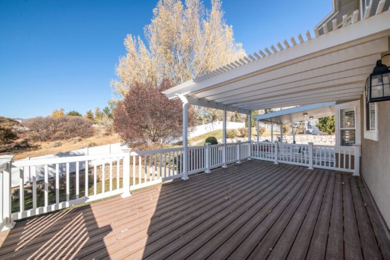 Large White Pergola Over a Back Deck
