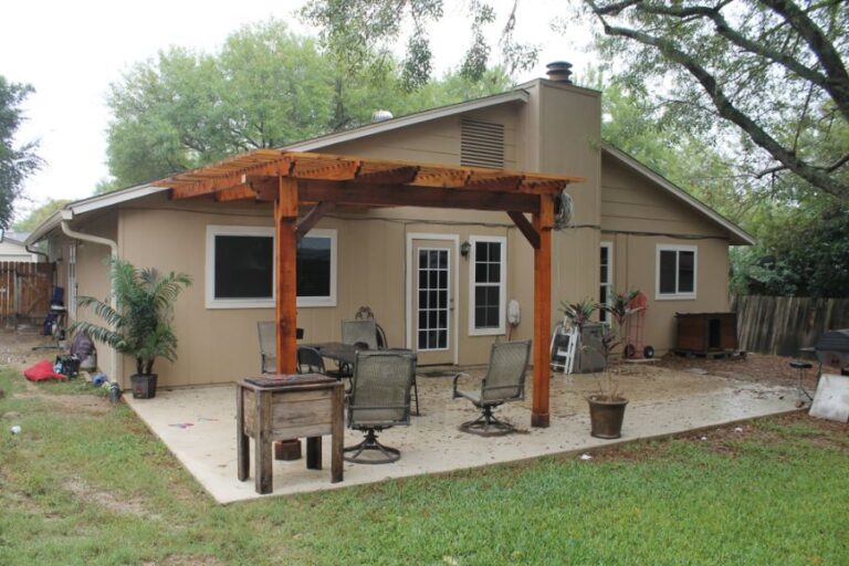 Pergola Over the Patio in the Backyard of a House