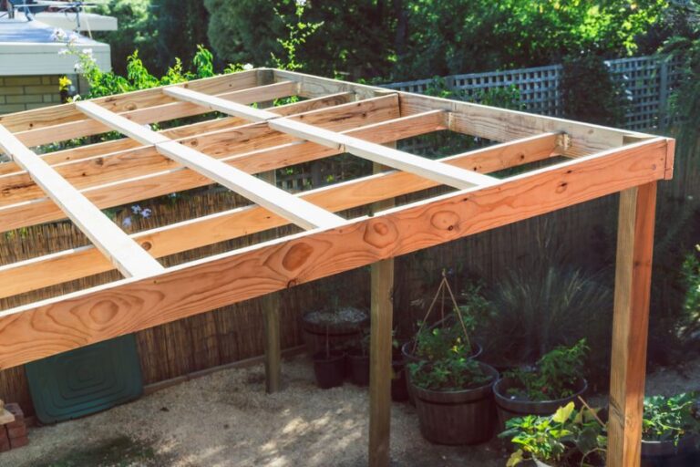 Small Pergola Being Built in a Backyard