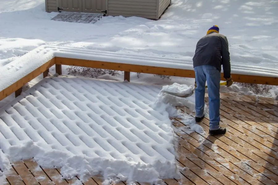 Shoveling Snow Off The Back Deck