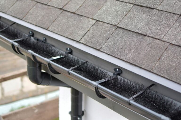 Gutter Equipped With a Gutter Brush