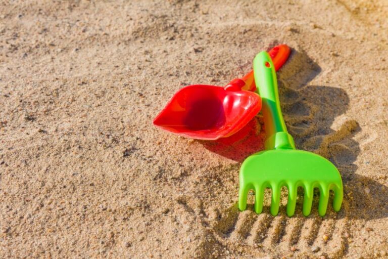 Colorful Sand Toys in a Sandbox