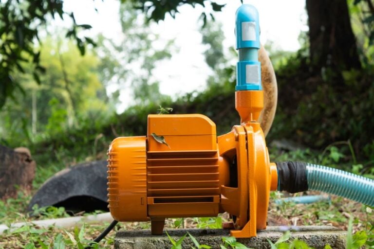 Electric Water Pump on the Edge of a Pond