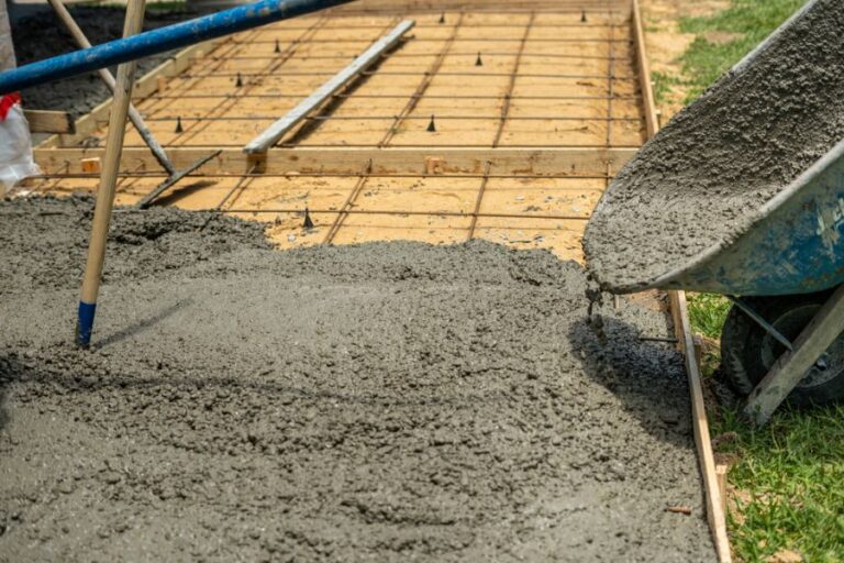 Concrete Patio Being Poured With a Wheelbarrow