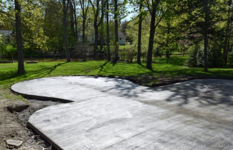 New Concrete Patio in a Large Backyard