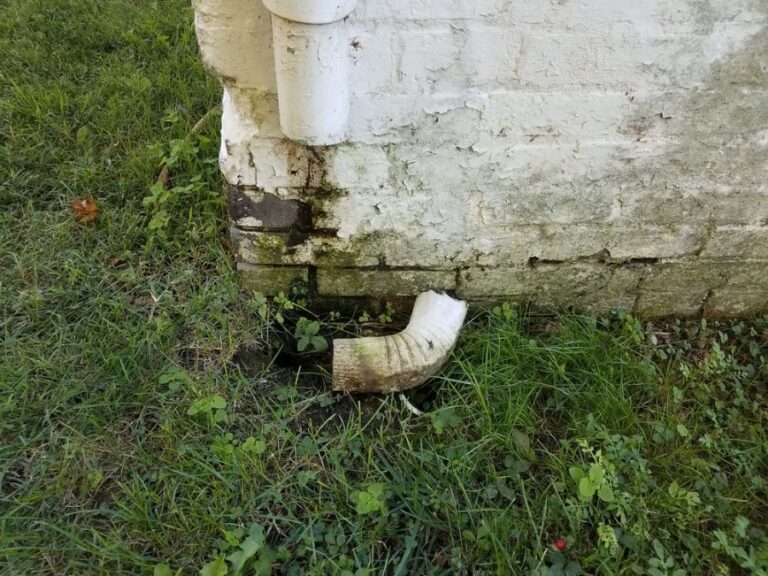 Broken Downspout on Old House