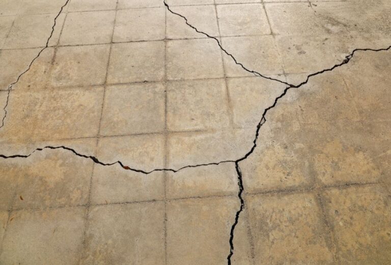 Patio With Large Cracks in Surface