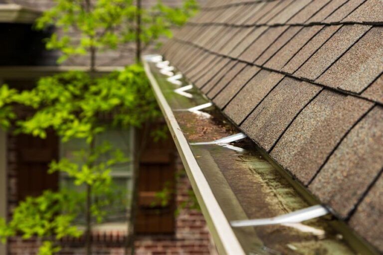 Rain Gutters on House Full of Standing Water