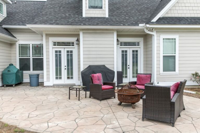 Stamped Concrete Patio Behind a House