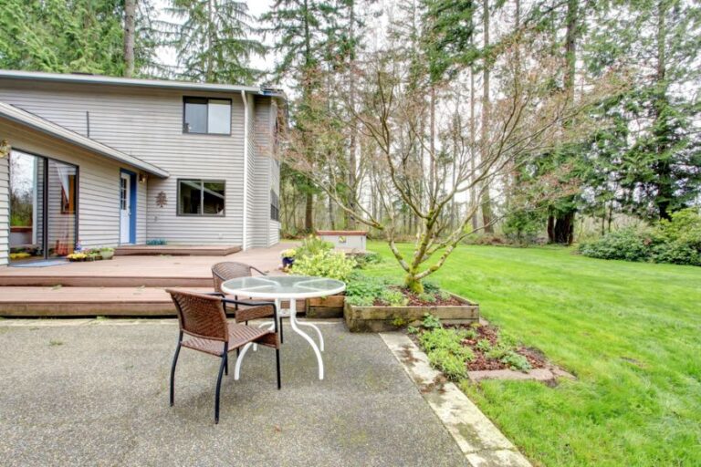 Wood Deck and Concrete Patio in a Backyard