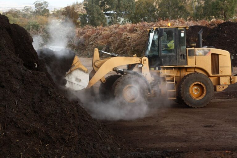 A Truck Scooping Mulch
