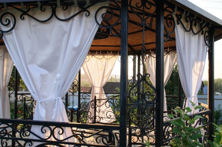 Older Metal Gazebo With Curtains