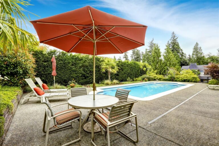 Red Patio Umbrella Over Patio Furniture