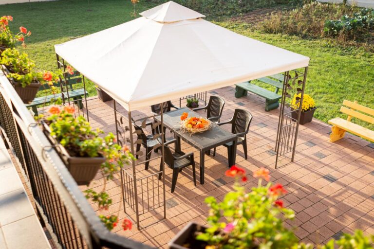 Gazebo on Brick Patio With Table and Chairs