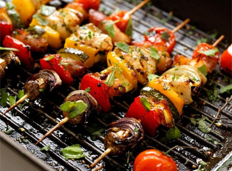 Grilling meat and vegetable skewers