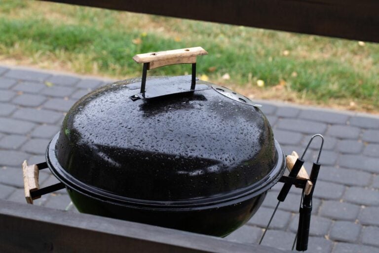 A grill covered in rain drops