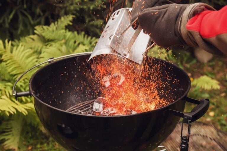 Chimney starter with a grill